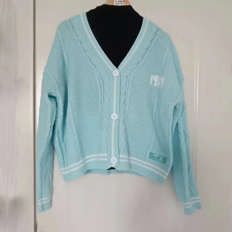 Elegant Blue 1989 Women's Cardigan with Bird Embroidery and V-Neck Design - Vintage Slouchy Knit Sweater