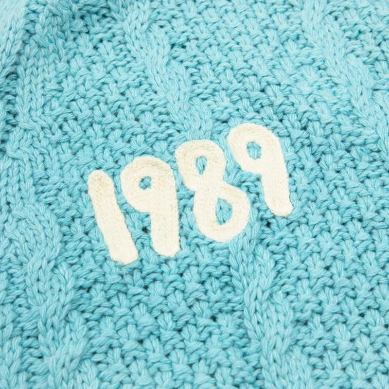 Elegant Blue 1989 Women's Cardigan with Bird Embroidery and V-Neck Design - Vintage Slouchy Knit Sweater